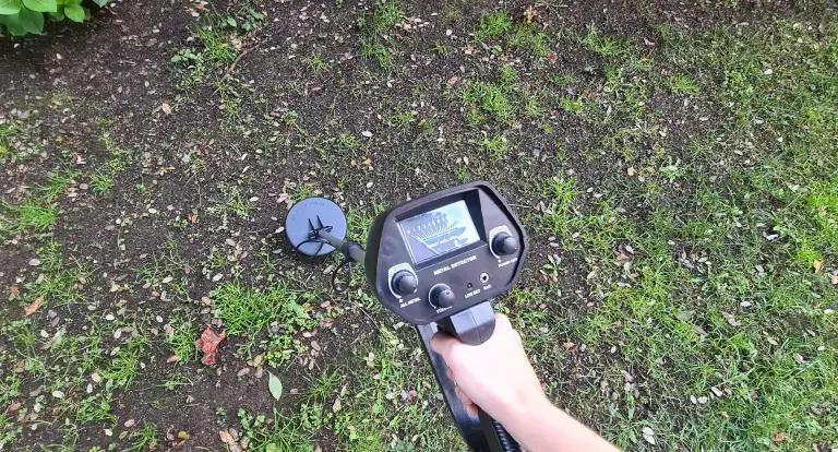 Using ironcex metal detector on grass.